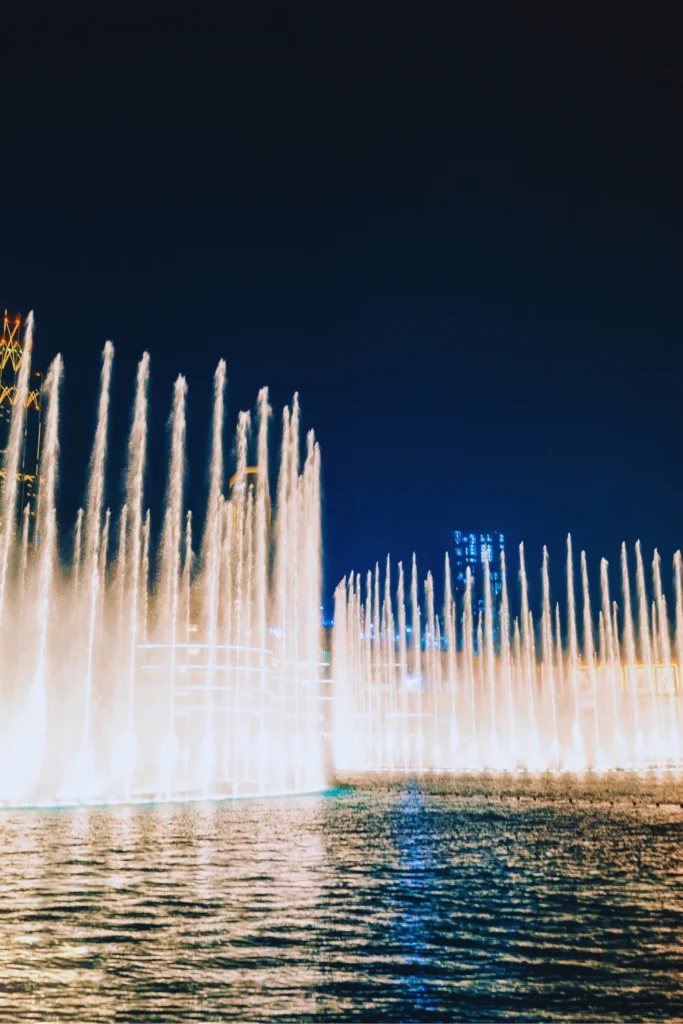 Dubai Fountain show with water lights and music at night